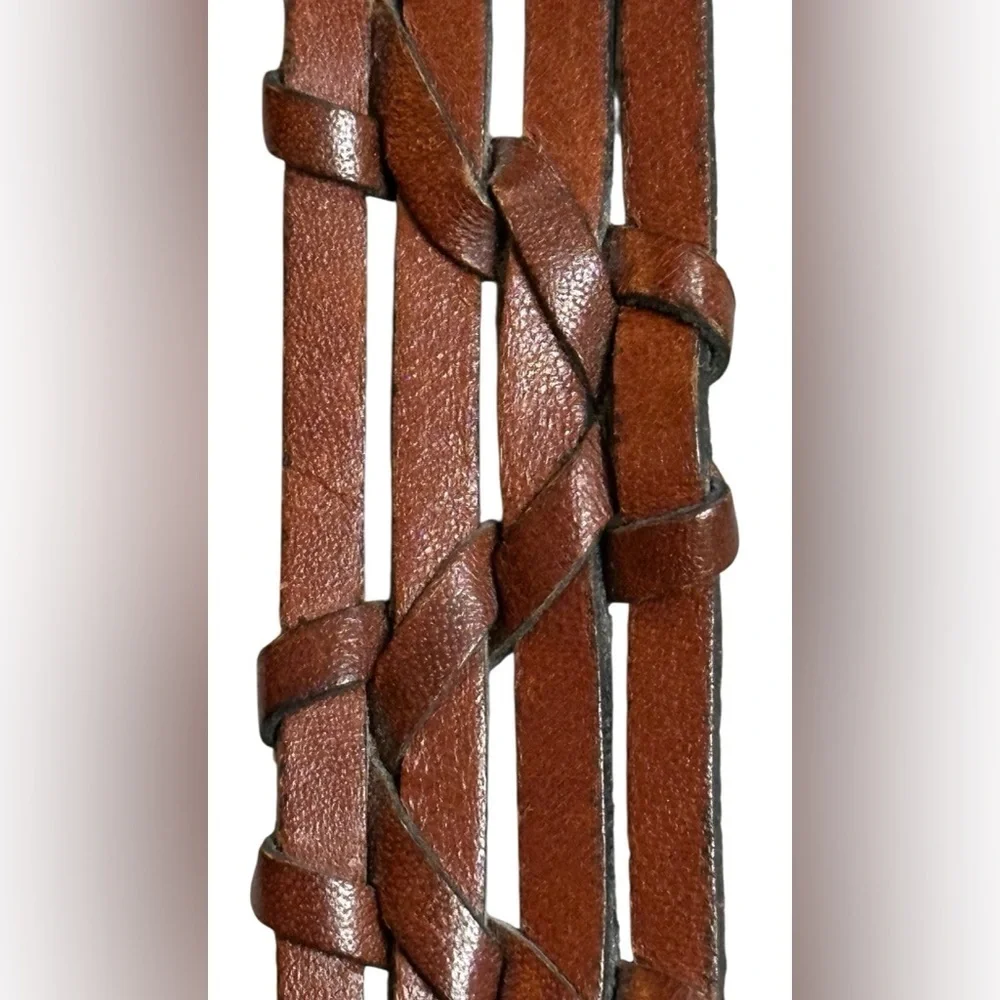 A men’s / women’s leather braided belt, Made in Uraguay. M.